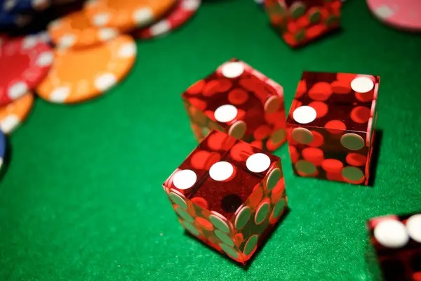 Multi-camera live dealer studio with blackjack table and player interface overlays